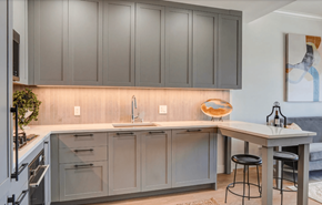 Los Angeles apartment for rent - a kitchen with gray cabinets and a white counter top