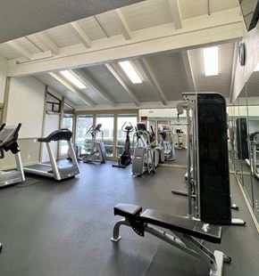 Buena Park apartment for rent - A gym with treadmills, weights, and other exercise equipment.