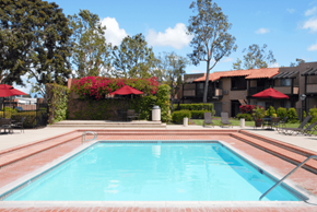 Westminster apartment for rent - A swimming pool surrounded by a red tile border.