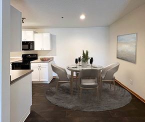 Fairlawn apartment for rent - A dining room with a table set for four.