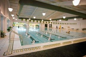 Clayton apartment for rent - a large swimming pool with people in it