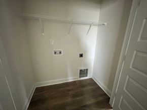 Clayton apartment for rent - A room with a white wall and a small ventilation pipe.