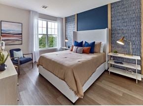 Brewster apartment for rent - a bedroom with a bed and a window