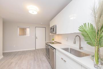 Jackson apartment for rent - A kitchen with white cabinets and a sink.