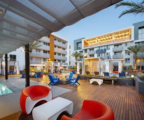 Woodland Hills apartment for rent - Woodland Hills, CA Luxury Apartments - The Q Variel - Sundeck with a Resort-Style Pool, a Heated Spa, Cabanas, Daybeds, and Fire Pits