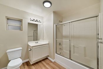 Spacious bathtub with enclosed shower doors