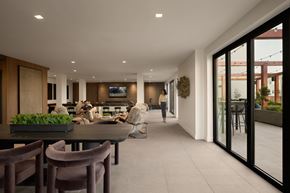 Woodland Hills apartment for rent - A modern dining room with a table set for four.