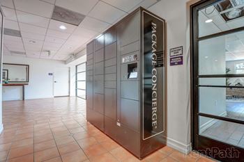 A stainless steel elevator in a lobby of a building