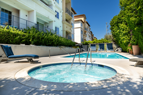 Canoga Park apartment for rent - A small round pool with a ladder in the middle of it.
