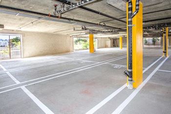 Covered garage parking with controlled access