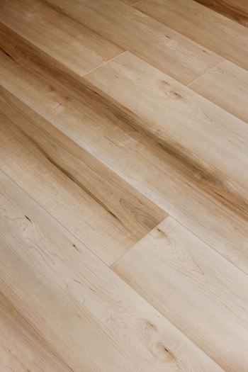 Luxury vinyl and tile hard-surface flooring through-out