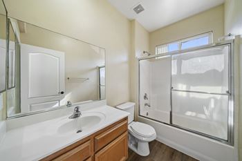 Spacious bathtub with enclosed shower doors