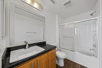 Spacious bathtub with enclosed shower doors