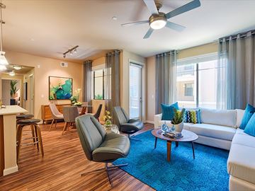 Phoenix apartment for rent - a living room with a couch and a ceiling fan