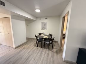 Carrollton apartment for rent - A dining room with a table and chairs.