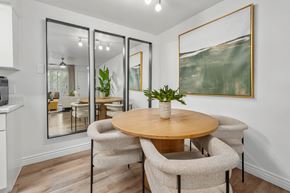 Tucson apartment for rent - A dining room with a round table and chairs.