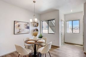 Tucson apartment for rent - A dining room with a table set for four.