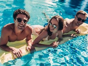 Philadelphia apartment for rent - three young adults on a floatie in a pool