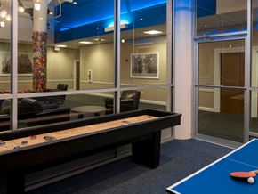 Philadelphia apartment for rent - Kardon Atlantic’s game lounge with shuffleboard and ping pong tables
