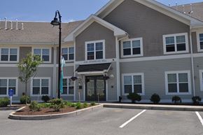 Bourne apartment for rent - the front of a building with a street light in front of it