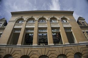 Pittsfield apartment for rent - the facade of a building with a row of windows