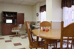 Pittsfield apartment for rent - a dining room with a table and chairs
