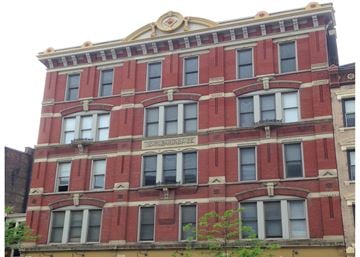 Cincinnati apartment for rent - A red brick building with a sign that says "Telegraph".