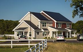 South Dennis apartment for rent - a house with solar panels on the roof