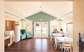 South Dennis apartment for rent - two people sitting at a table in a dining room