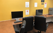 Chicago apartment for rent - a desk with two computer monitors on it