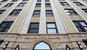 Chicago apartment for rent - the front of a tall building with many windows
