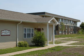 Kankakee apartment for rent - a building with a sign in front of it