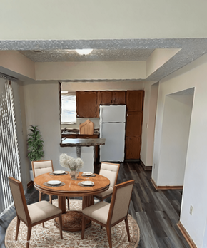 Blacklick apartment for rent - A dining room with a round table and chairs.