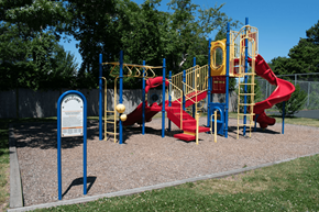 Hyannis apartment for rent - a playground with a red slide and yellow monkey bars