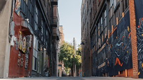 Seattle apartment for rent - a city street with buildings with graffiti on them