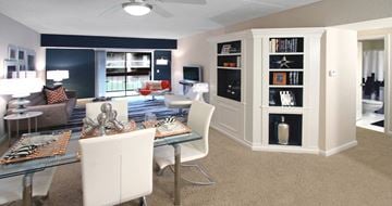 Omaha apartment for rent - a living room and dining room with a table and chairs