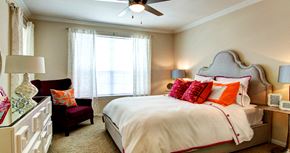 Houston apartment for rent - Spacious bedroom with walk-in closet and ceiling fan at Tuscany Apartments in Houston.
