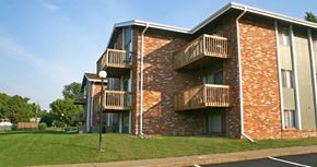 La Vista apartment for rent - Apartments in La Vista with brick exteriors, park-like setting, scenic views, and lots of trees at The Inverness Apartments