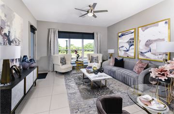 Golden Valley apartment for rent - a living room filled with furniture and a ceiling fan