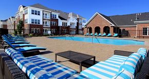 West Des Moines apartment for rent - Luxury apartments with swimming pool, poolside lounges, and brick exteriors at Bellemeade Apartments in west Des Moines