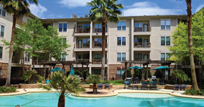 Houston apartment for rent - Luxury swimming pool with cabanas, poolside lounges, grilling stations, palm trees and beautiful landscaping at The Voss Apartments in Houston.