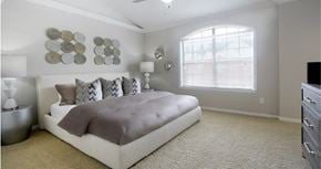 Houston apartment for rent - Huge master bedroom, spacious master bedroom with ceiling fan, high vaulted ceiling, over-sized windows, walk-in closet and attached luxury bath suite at Tuscany Villas in Houston.
