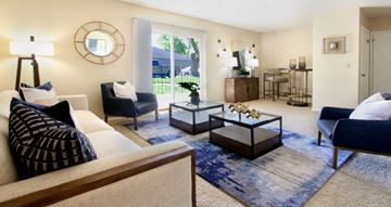 La Vista apartment for rent - a living room with a couch and chairs and a table