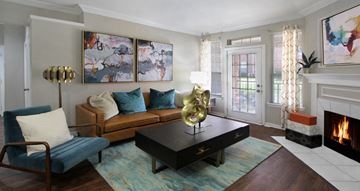 Urbandale apartment for rent - a living room with a couch and a fireplace