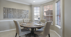 Omaha apartment for rent - Luxury apartments in central Omaha with spacious dining room with bay windows, oversized windows, and crown molding at The Biltmore Apartments in Omaha, Nebraska