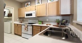 Dallas apartment for rent - Luxury apartments with spacious kitchen, full-size washer and dryer, breakfast bar, washed oak cabinets, and 9-foot ceilings at Kensington Square Apartments.