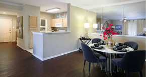 Dallas apartment for rent - Luxury apartments with spacious kitchen, wood plank floors, breakfast bar, washed oak cabinets, mirror accent wall, spacious dining room, extra pantry storage, and 9-foot ceilings at Kensington Square Apartments.