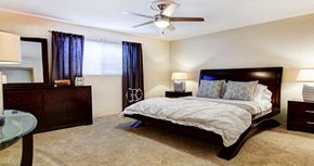 Houston apartment for rent - Spacious bedroom with ceiling fan and walk-in closet at Plantation apartments near the Galleria in Houston.
