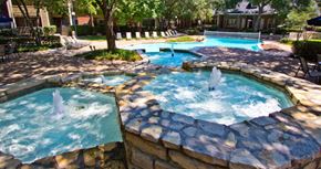 Dallas apartment for rent - Luxury apartments with beautiful fountains, beautiful landscaping, swimming pool with poolside lounge chairs, and scenic views at Preston Village Apartments in north Dallas