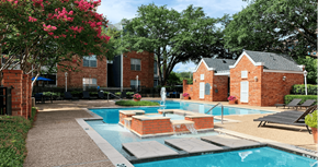 Dallas apartment for rent - Luxury apartments with two swimming pools with fountain, poolside lounge chairs, and beautiful landscaping in Dallas